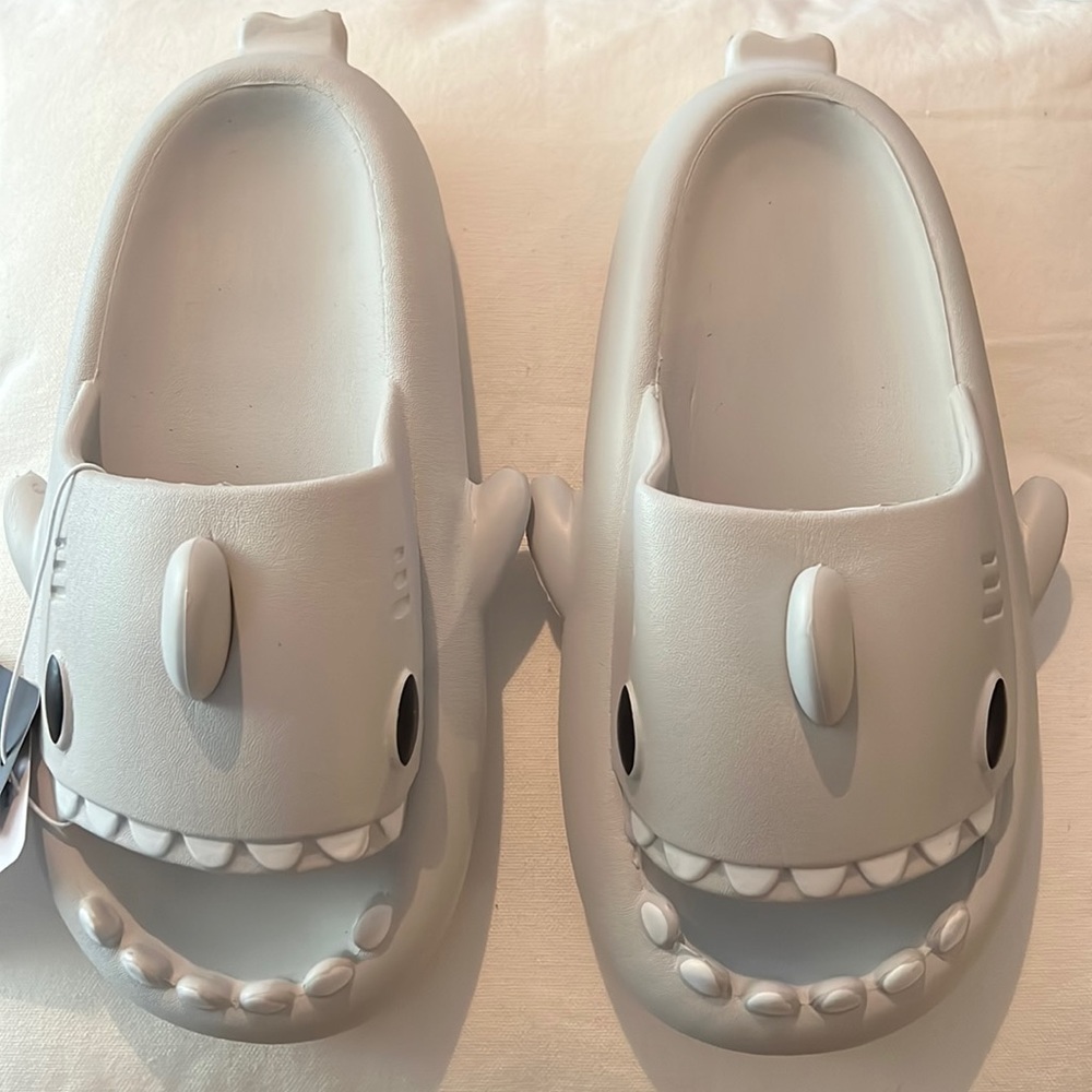 Shark slippers/slides. So comfortable. Woman’s 7.5-8/Men’s 6.5-7